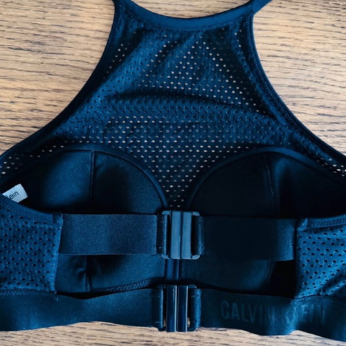 Calvin Klein swimwear top, size small, black