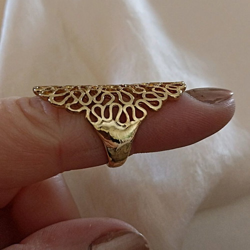 Gold ring ornate like new