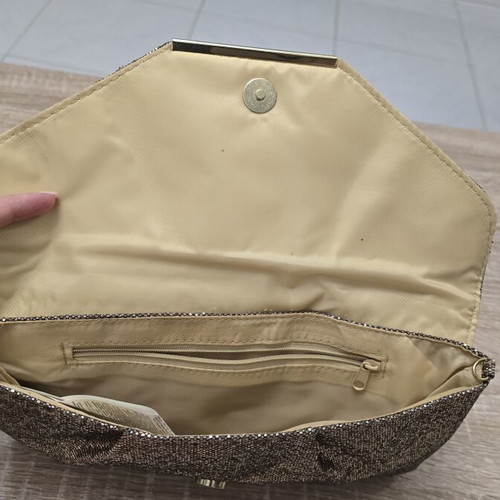 Clutch bag with subtle gold shimmer, like new