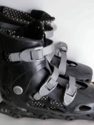 Black roller skates used, size 40/41