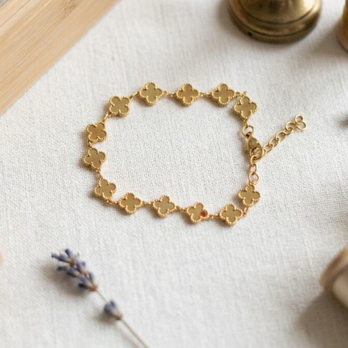Gold bracelet with four-leaf clover design, brand new