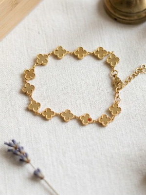 Gold bracelet with four-leaf clover design, brand new