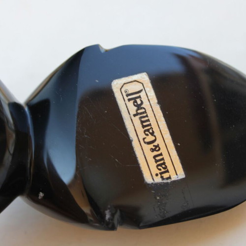 Obsidian African face sculpture
