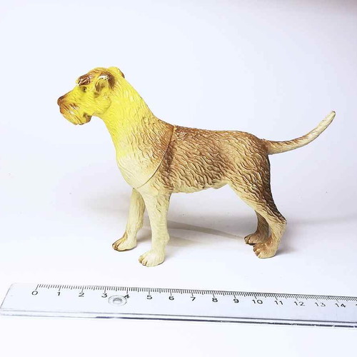 Dog plastic figure used with scratches and marks