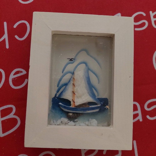 White frame with boat theme like new
