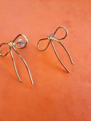 Bow earrings like new, gold-colored