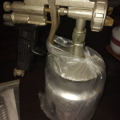 Paint spray gun with container used, professional