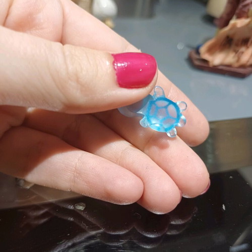 Glowing turtle new, blue, glass-like or hard plastic material