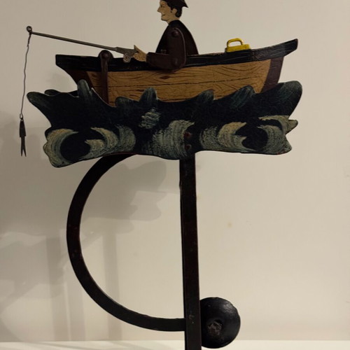 Vintage style folk art pendulum with fisherman in boat used