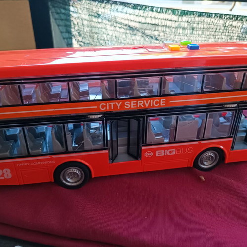 Toy bus used with lights and sounds