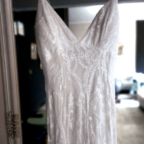 Mermaid wedding dress with thin straps, tulle and sewn sequins, like new