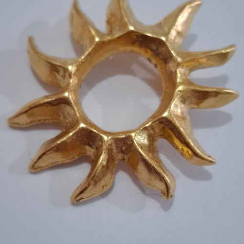Vintage Lancome Paris Gilt Sun Burst brooch used, gilt color