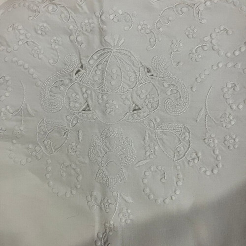Single bed sheet set with grey fitted sheet and white embroidered pillowcase
