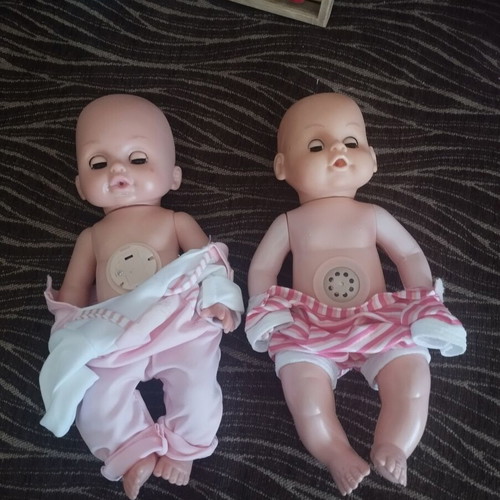 Baby dolls with extra toys, pack of 2