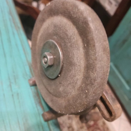 Old hand-operated grinding wheel used