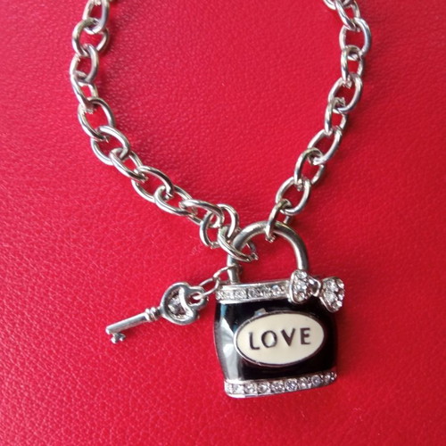 Bracelet with hanging charms used