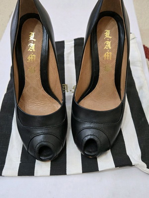 L.A.M.B. black peep toe leather pumps like new