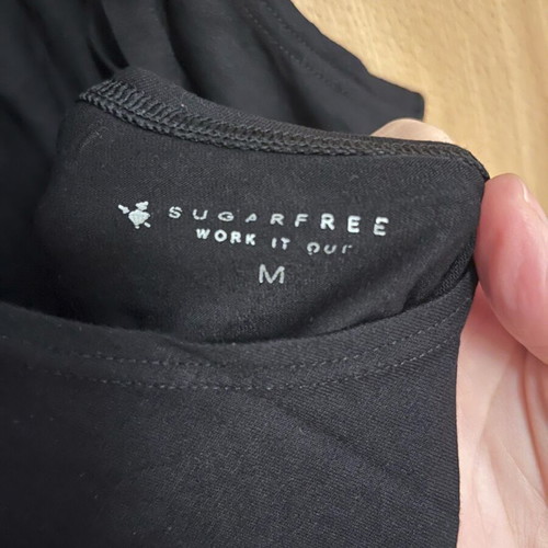 SugarFree black sleeveless shirt like new, size M