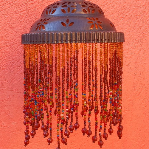 Wall light with beaded fringe