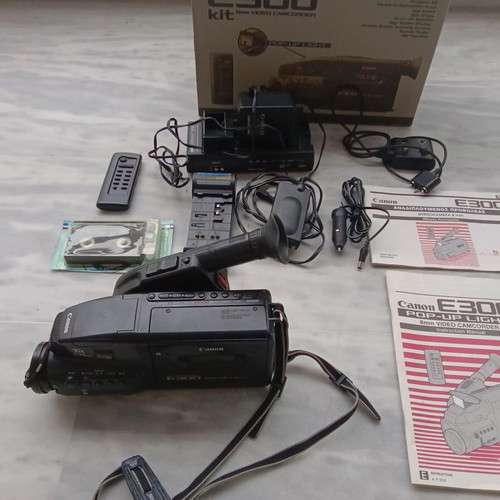Canon E300 video camera used, non-functional, with accessories