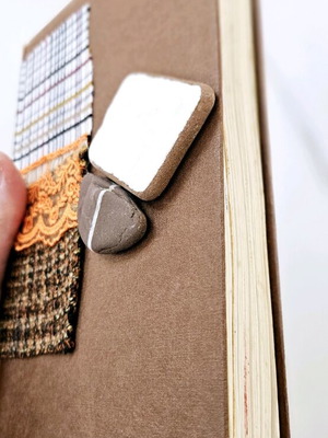 Refurbished book To Kane-Oti-Theleis with stones and 92 pages