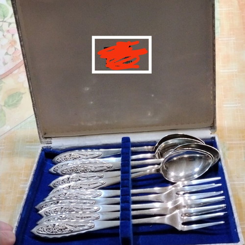Vintage silver dessert spoons set with original case, used