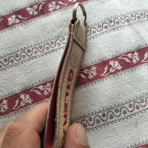 Gilera keychain like new, beige and red