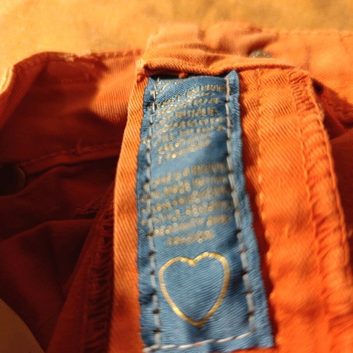 Please Italian orange jeans size M used