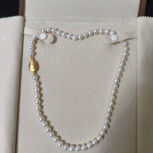 Pearl necklace new with 14K gold clasp