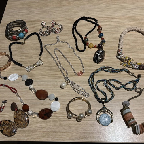 Jar treasure with assorted women's jewelry and accessories