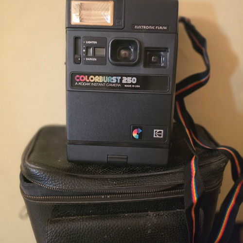 Kodak Colorburst 250 vintage instant camera with electronic flash, strap and case