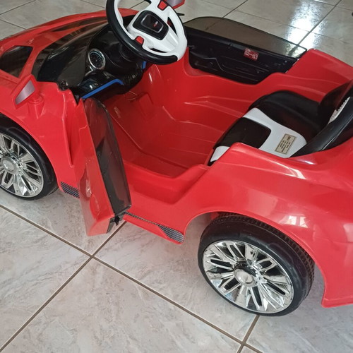 Electric children's car with light, music and remote control