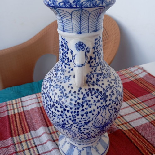 Vintage porcelain vase used, traditional Asian style blue and white Ming Qing design