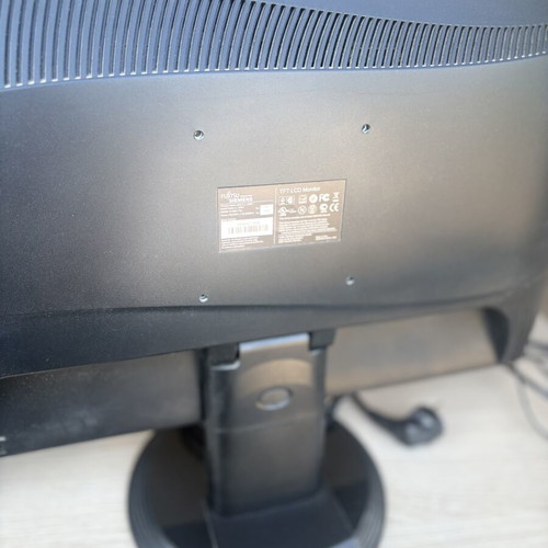 Fujitsu-Siemens computer monitor and Logitech speakers with keyboard and webcam