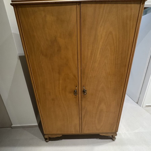 Wooden double-door wardrobe with internal drawers