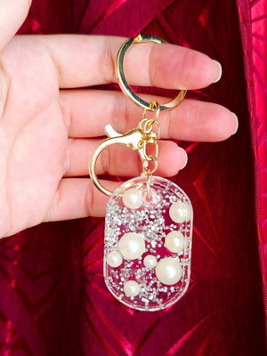 Handmade keychain new resin with pearls and silver detail