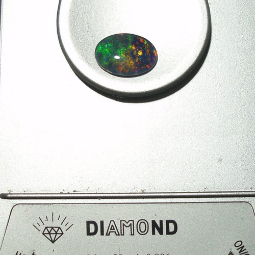 Australlian Opal Doublet 3.340 ct new, size 14x10 mm
