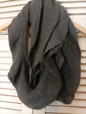 Knitted gray scarf used