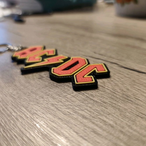AC/DC 3D Printed Keychain new with embossed texture
