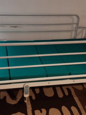 Automatic folding hospital bed with mattress and suction device