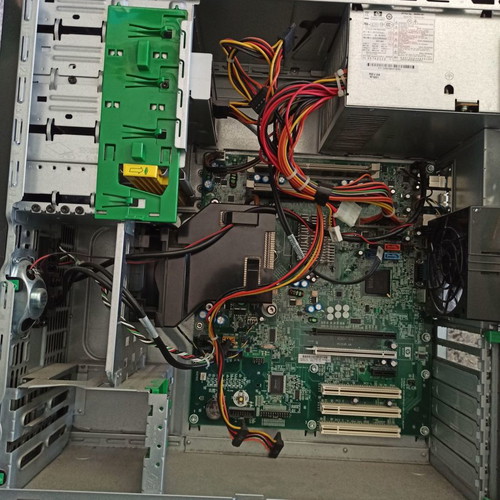 HP computer case used with power supply, RAM, processor, and DVD player