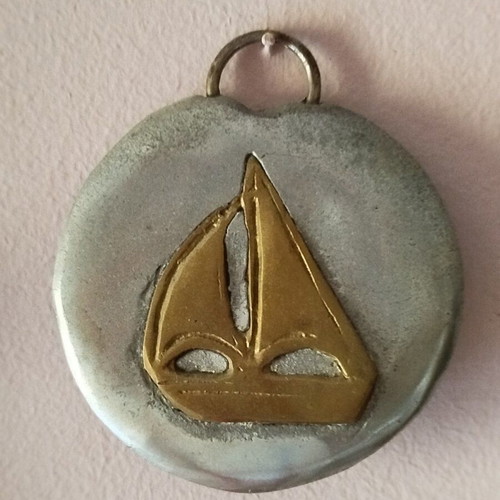 Wall decor used, metal two-tone, diameter 9.5 cm