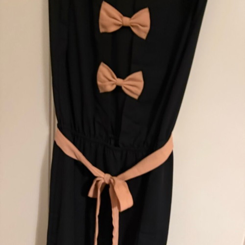 Black dress like new with peach bows and belt