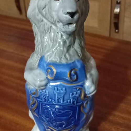 Traditional Ukrainian vodka in porcelain bottle with lion new