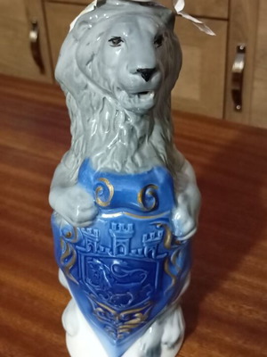 Traditional Ukrainian vodka in porcelain bottle with lion new