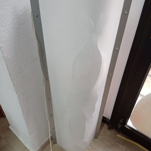 Slamp floor lamp used with woman design
