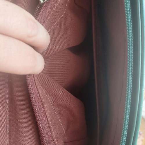 David Jones green backpack used with internal pocket repair needed