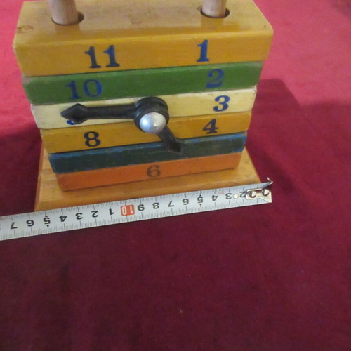 Wooden toy clock coil used 70s