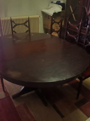 Round Extendable Dining Table with 4 Wooden Chairs used, classic