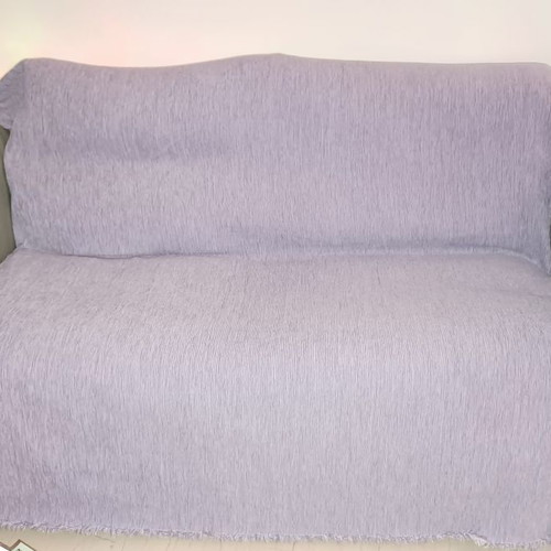 Two-seater sofa used, gray with purple-pink fabric on arms